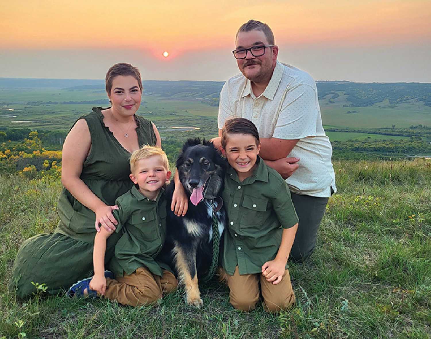 Haylee Johnson with her husband Rustin Campbell and their two boys, five-year-old Aldin Campbell, left, and eight-year-old Eastin Campbell, right. In middle is the family dog Gunner.